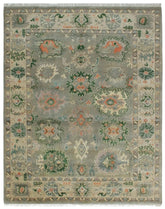 Hand-knotted green Oriental rug with floral medallion design